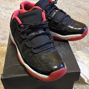 Air Jordan 11 retro low BG. Black and Red Athletic Sneakers